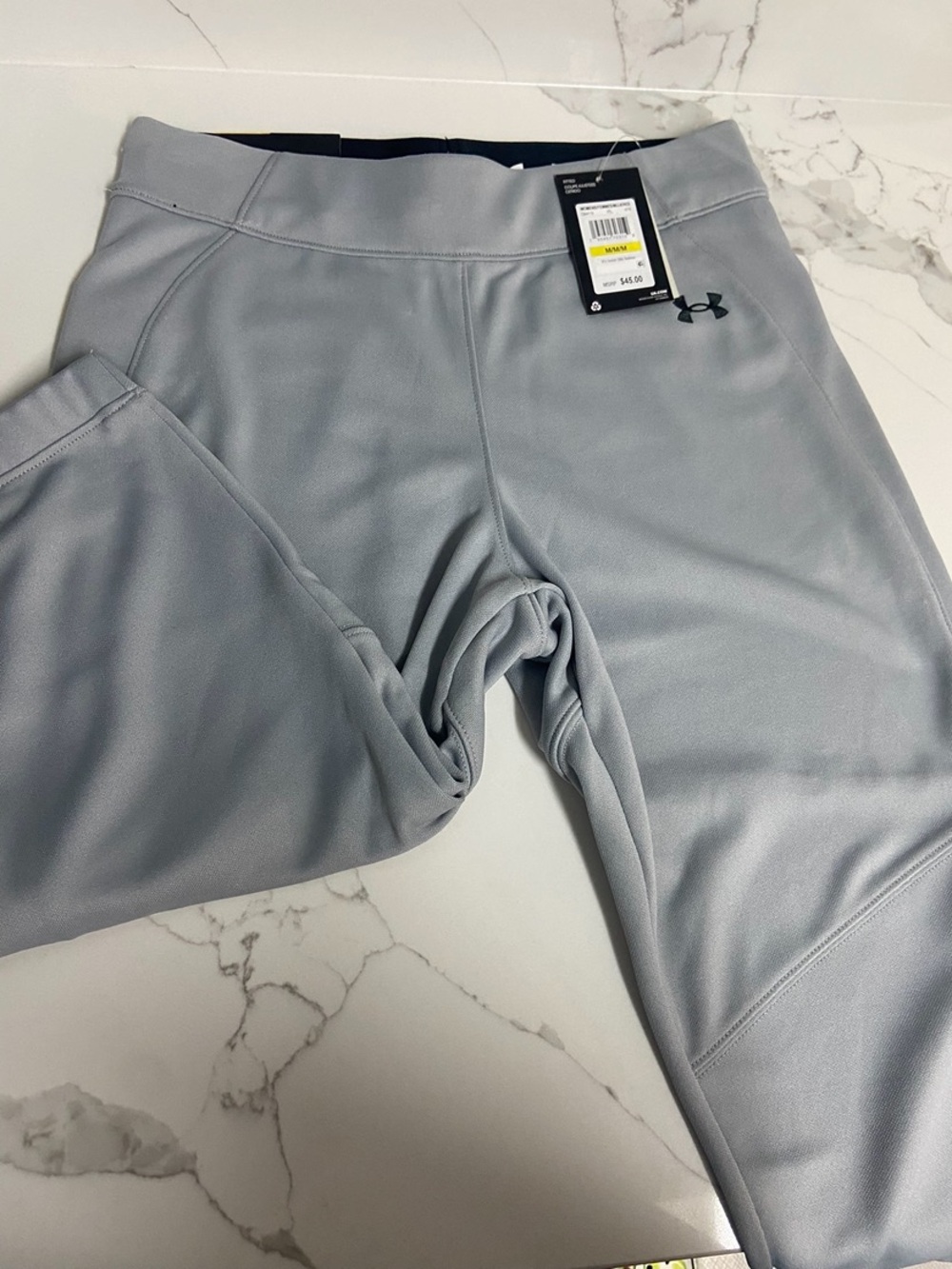 Under Armour medium women Light Gray Performance softball pants